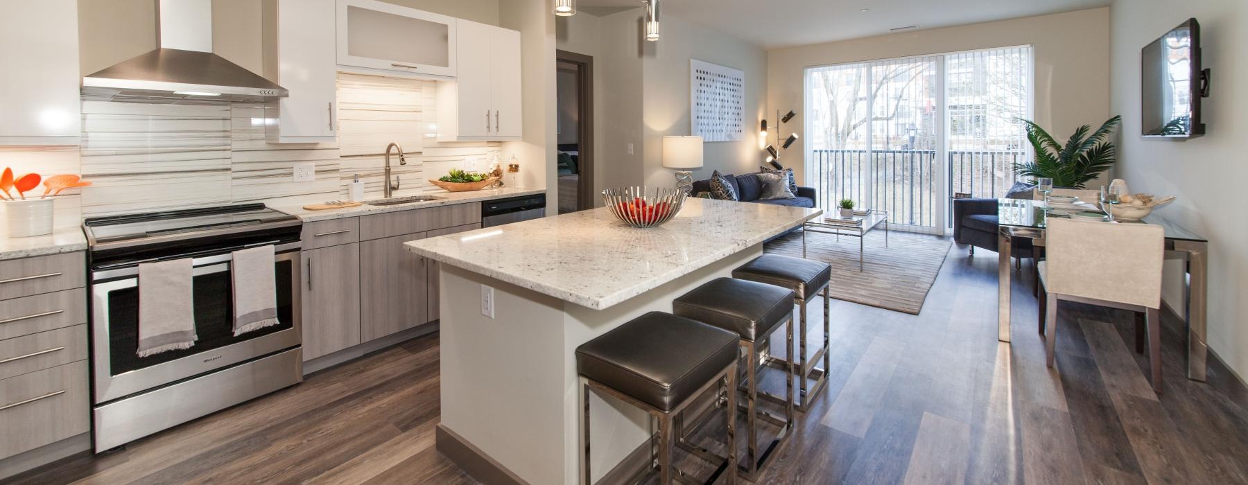 a kitchen with a bar stool